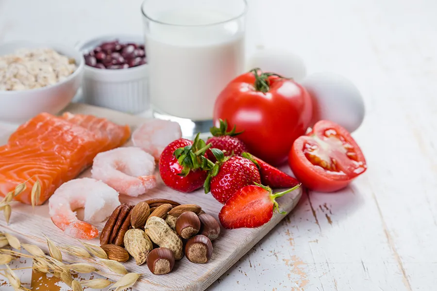 Food-Allergies-Clinic A board of foods like nuts, shellfish, and dairy, that are commonly associated with allergies. Get treatment for food allergies from AZENA Health & Longevity in Gainesville.